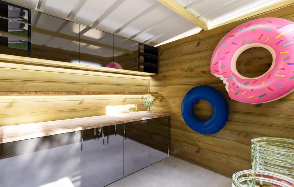 Abri jardin en bois avec décoration ludique, étagères et plan de travail