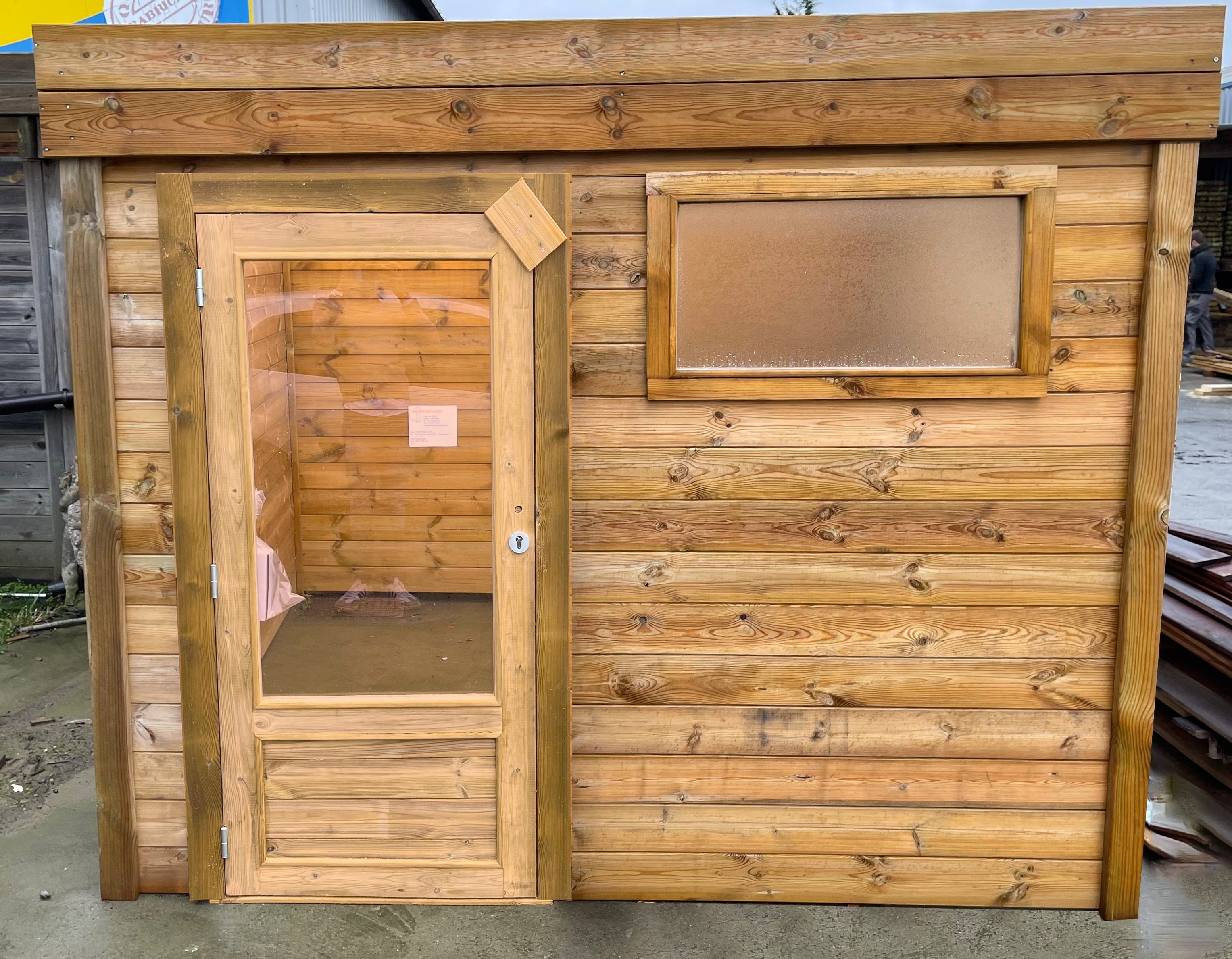 Abri jardin bois sur mesure — toit plat bac acier, bardage clins 27 mm horizontales
