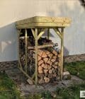 Abri à bûches 1 m × 2,27 m, adossé – mise en situation