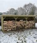 Abri à bûches 5 m × 1,30 m, avec gouttière – mise en situation